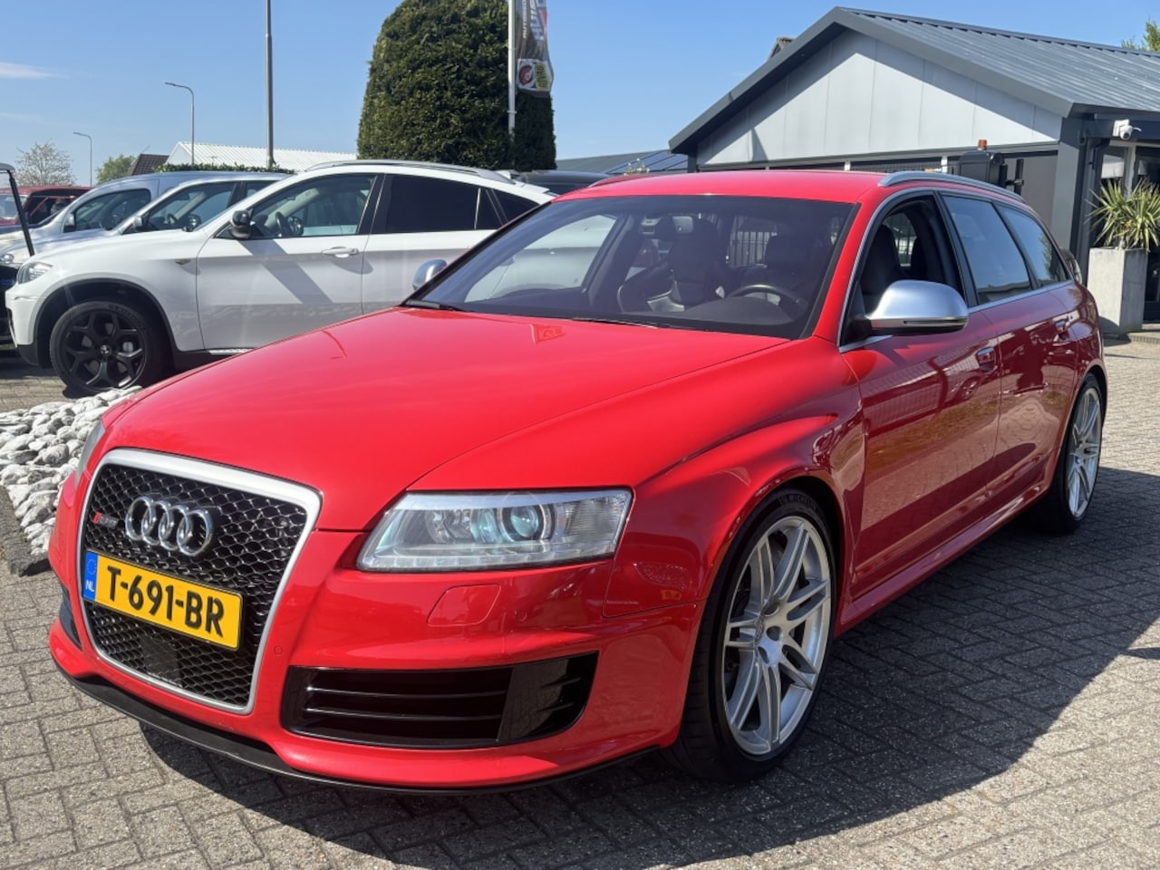 Audi RS6 - 5.0 TFSI Avant Rood 2009 Youngtimer Documentatie A6 S6 - AutoWereld.nl
