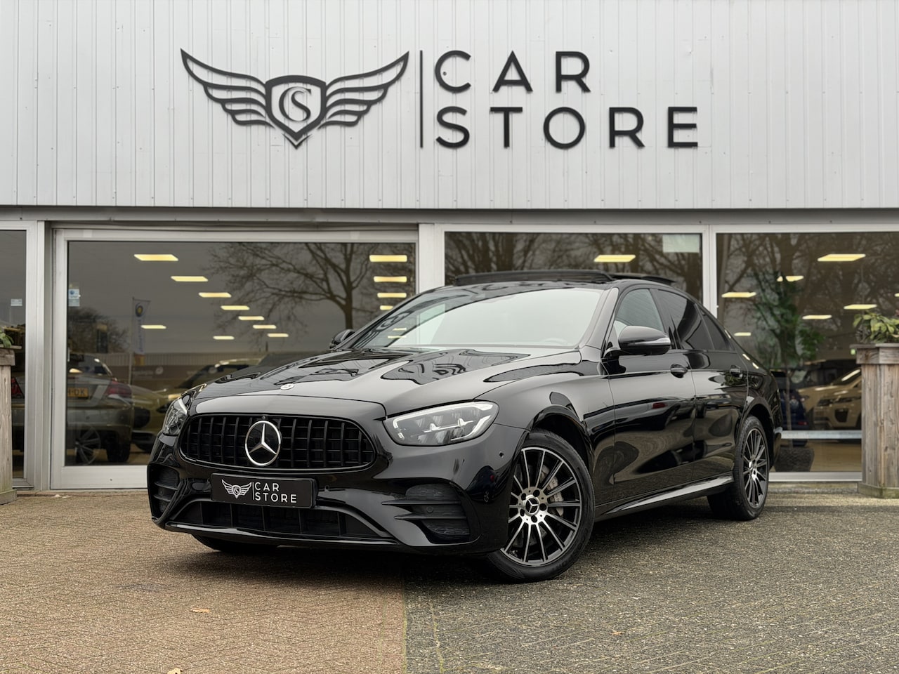 Mercedes-Benz E-klasse - 300 e 4MATIC AMG Line 320PK|PANO|HUD|AMBIENT|BURMESTER HE|360° CAMERA|+++ - AutoWereld.nl