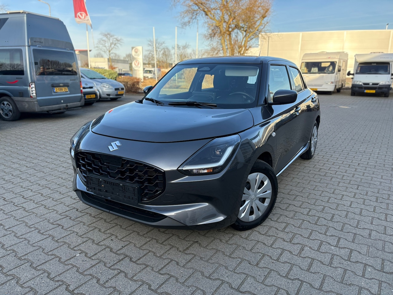 Suzuki Swift - 1.2 Comfort Smart Hybrid 1.2 Comfort Smart Hybrid - AutoWereld.nl