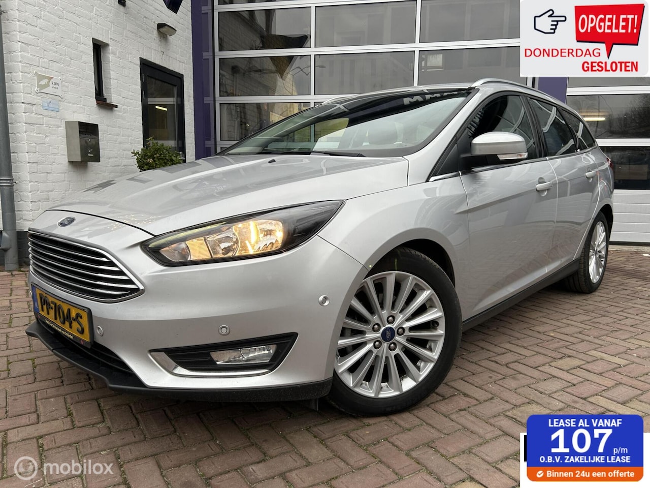 Ford Focus Wagon - 1.5 TDCI Titanium * AUTOMAAT * NAVIGATIE * - AutoWereld.nl
