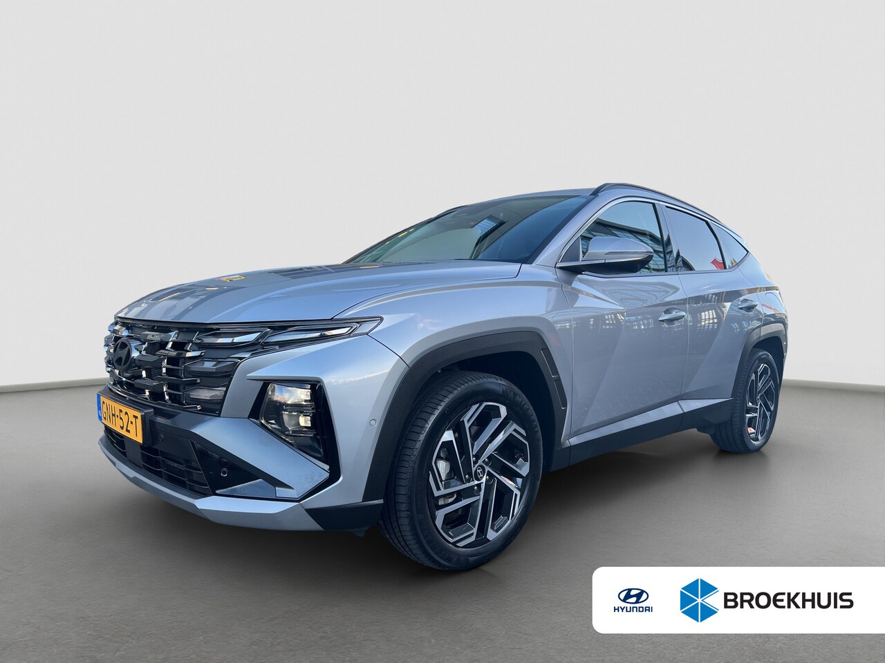 Hyundai Tucson - 1.6 T-GDI 252pk PHEV Premium 4WD Nieuw model! | Leder | Carplay | Climate | Keyless | Navi - AutoWereld.nl