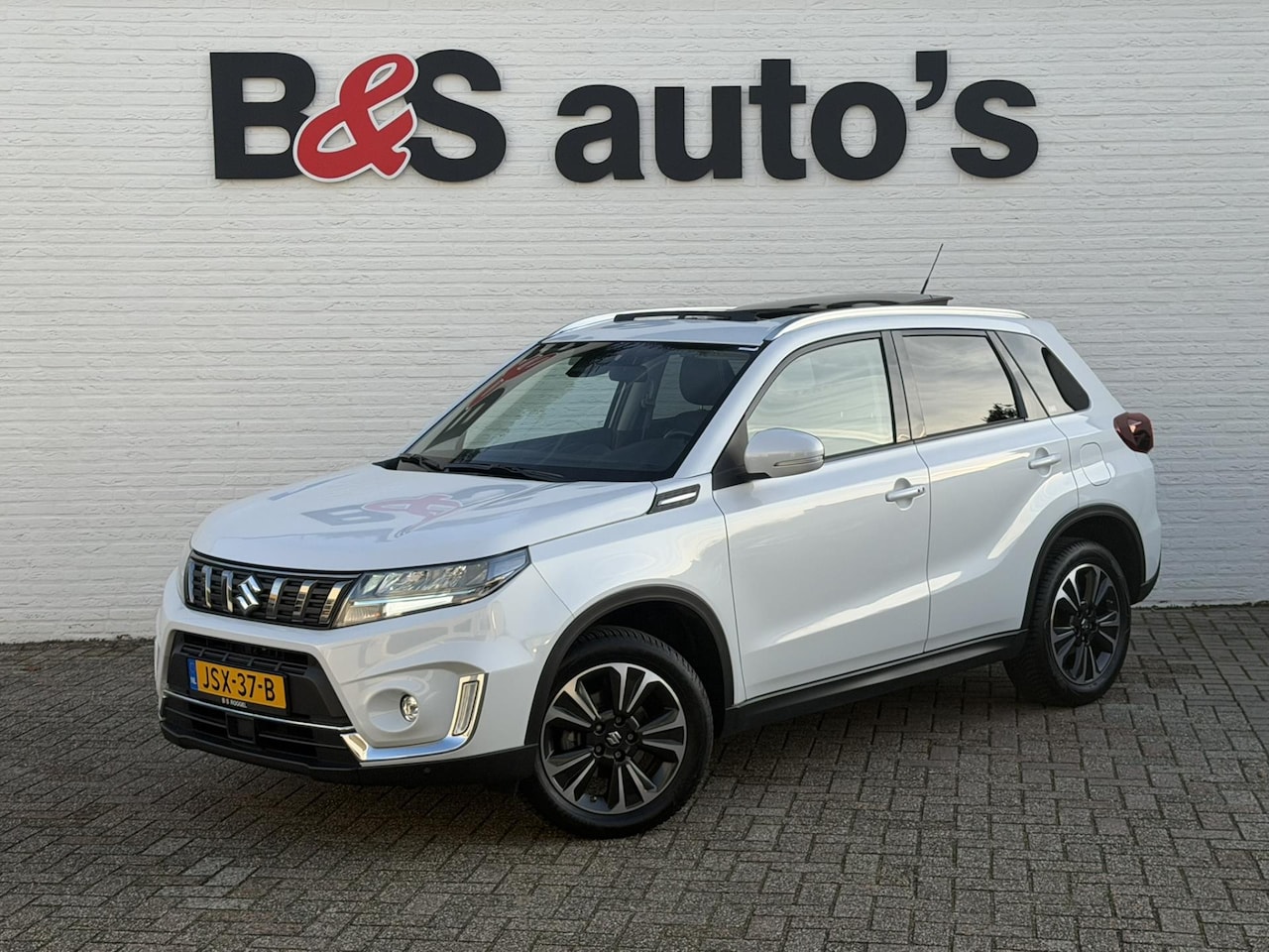 Suzuki Vitara - 1.5 Hybrid Panorama Full led Automaat Camera+Pdc Stoelverwarming Adapt. Cruise Navi - AutoWereld.nl