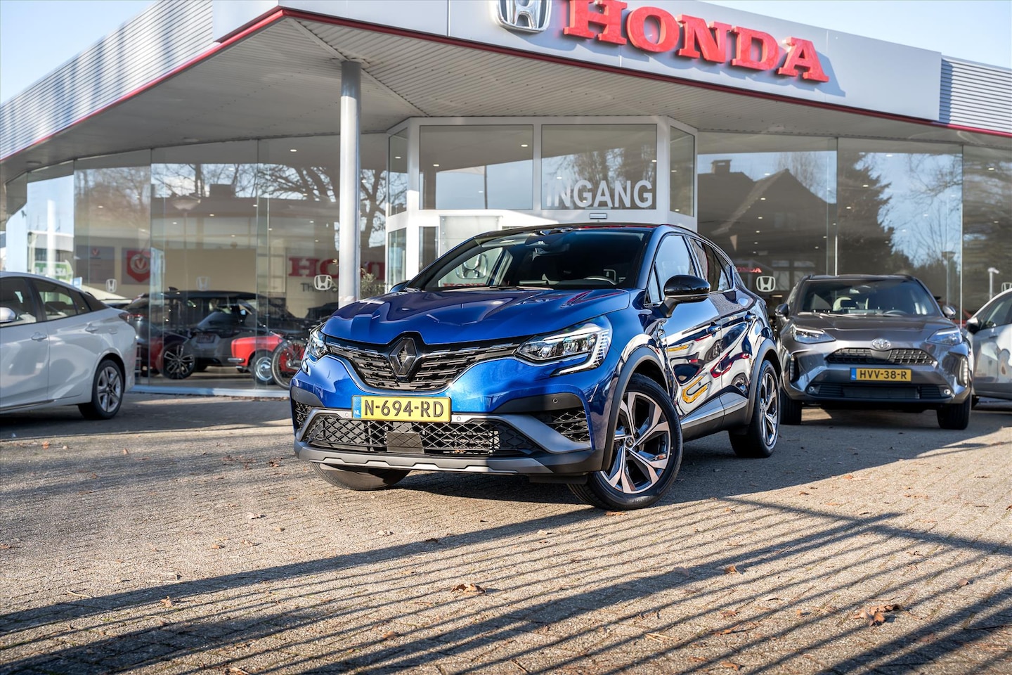 Renault Captur - 1.6 E-Tech Hybrid 140pk R.S. Line Automaat | NL Auto | Dealeronderhouden | Navigatie | Cam - AutoWereld.nl