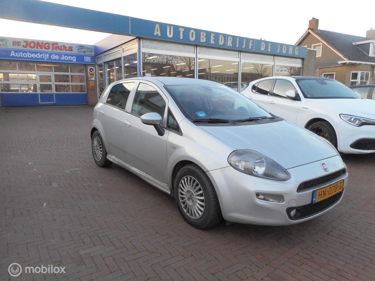 Fiat Punto - 1.3 MultiJet 80 Lounge 5d TREKHAAK+ARMSTEUN+METALLIC+1E EIGENAAR - AutoWereld.nl