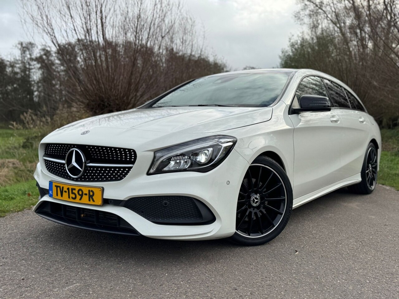 Mercedes-Benz CLA-klasse Shooting Brake - 200 Prestige Automaat / Airco / Navi / Luxe Leder / Stoelverw / CC / Elektrisch Achterklep - AutoWereld.nl