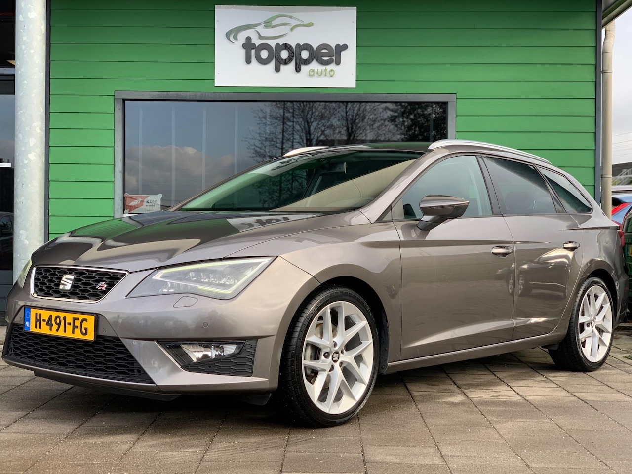 SEAT Leon ST - 1.4 TSI FR Style Business | Cruise Control | Navi | LED | Elekt.Ramen | - AutoWereld.nl