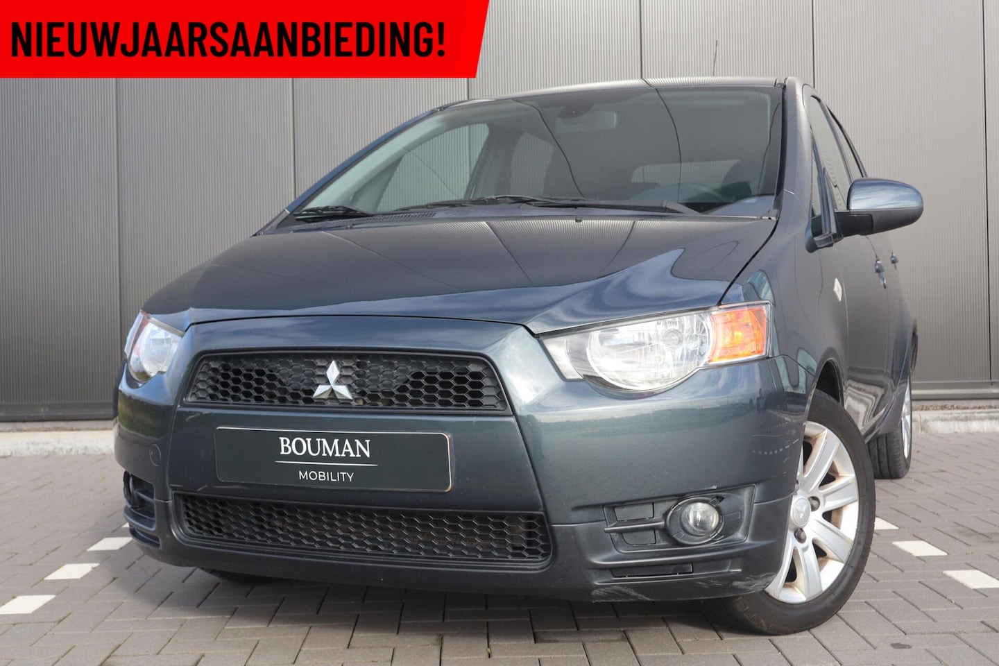 Mitsubishi Colt - 1.3 35 JAHRE, CRUISE, AIRCO, PDC, 5DEURS - AutoWereld.nl