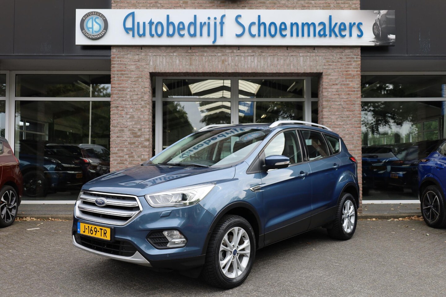 Ford Kuga - 1.5 EcoBoost Titanium TREKHAAK STUUR/RUIT/STOELVERWARMING 2xPDC HALFLEER PARKASSIST 17"LMV - AutoWereld.nl
