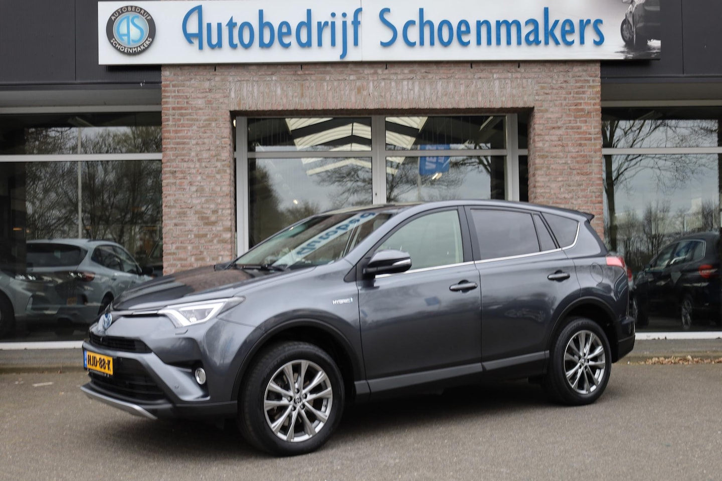 Toyota RAV4 - 2.5 Hybrid AWD LEER/MEMORY CAMERA PANO 18"LMV ELEK.LAADKLEP STOELVERW. DAB NAVI ENZ. - AutoWereld.nl