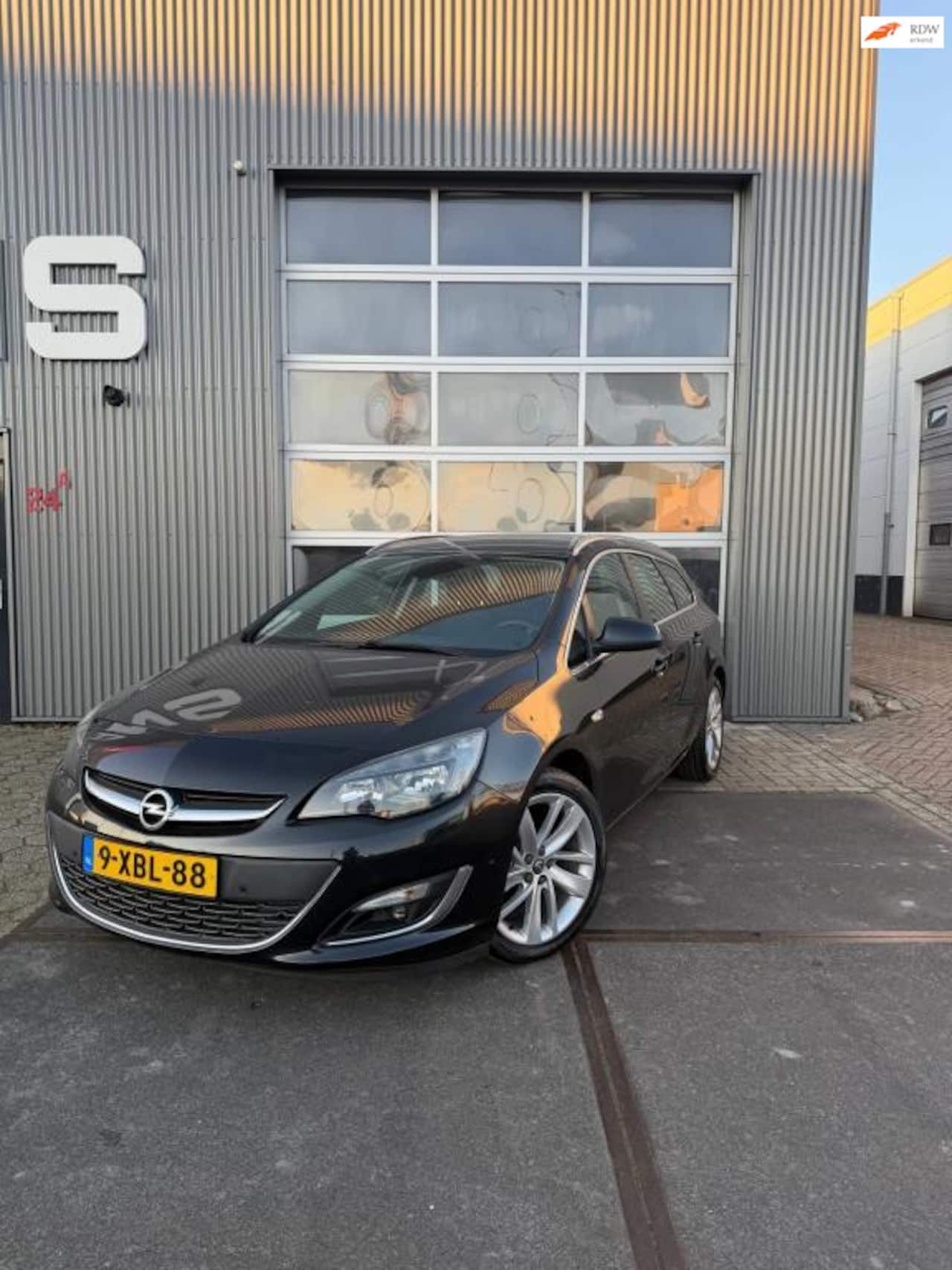 Opel Astra Sports Tourer - 1.4 Turbo Sport 1.4 Turbo Sport - AutoWereld.nl