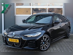 BMW i4 - EDrive35 70 kWh M-Sport | Fabrieksgarantie & Schuif-/kanteldak | Nette en complete Nederla