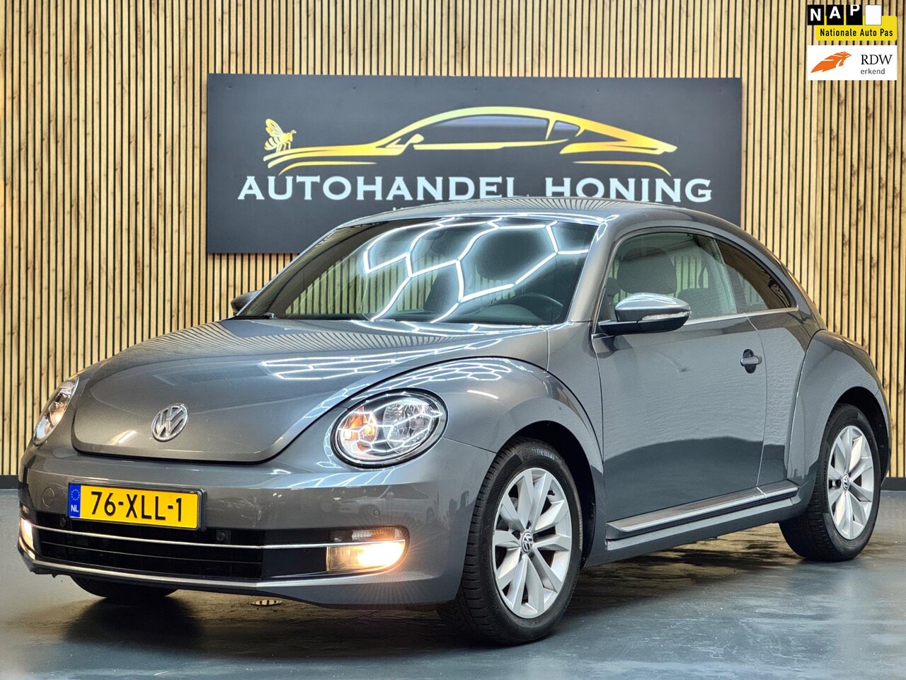 Volkswagen Beetle - 1.2 TSI Design|NAVI|PSENSOR|CRUISE|AIRCO - AutoWereld.nl