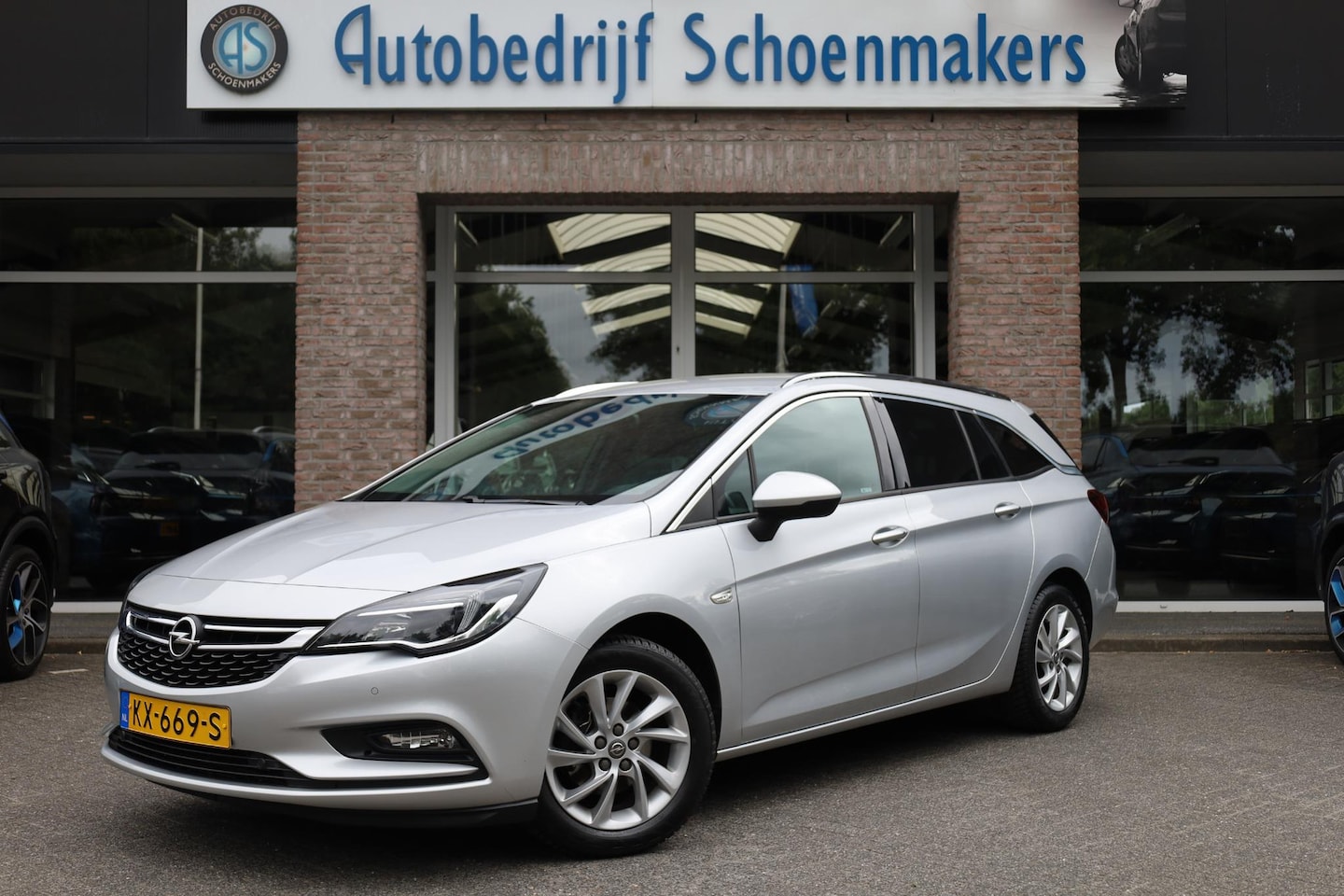 Opel Astra Sports Tourer - 1.4 Innovation TREKHAAK CARPLAY HALF-LEER ELEC.ACHTERKLEP/SPIEGELS CRUISE DAB CLIMA 2XPDC - AutoWereld.nl