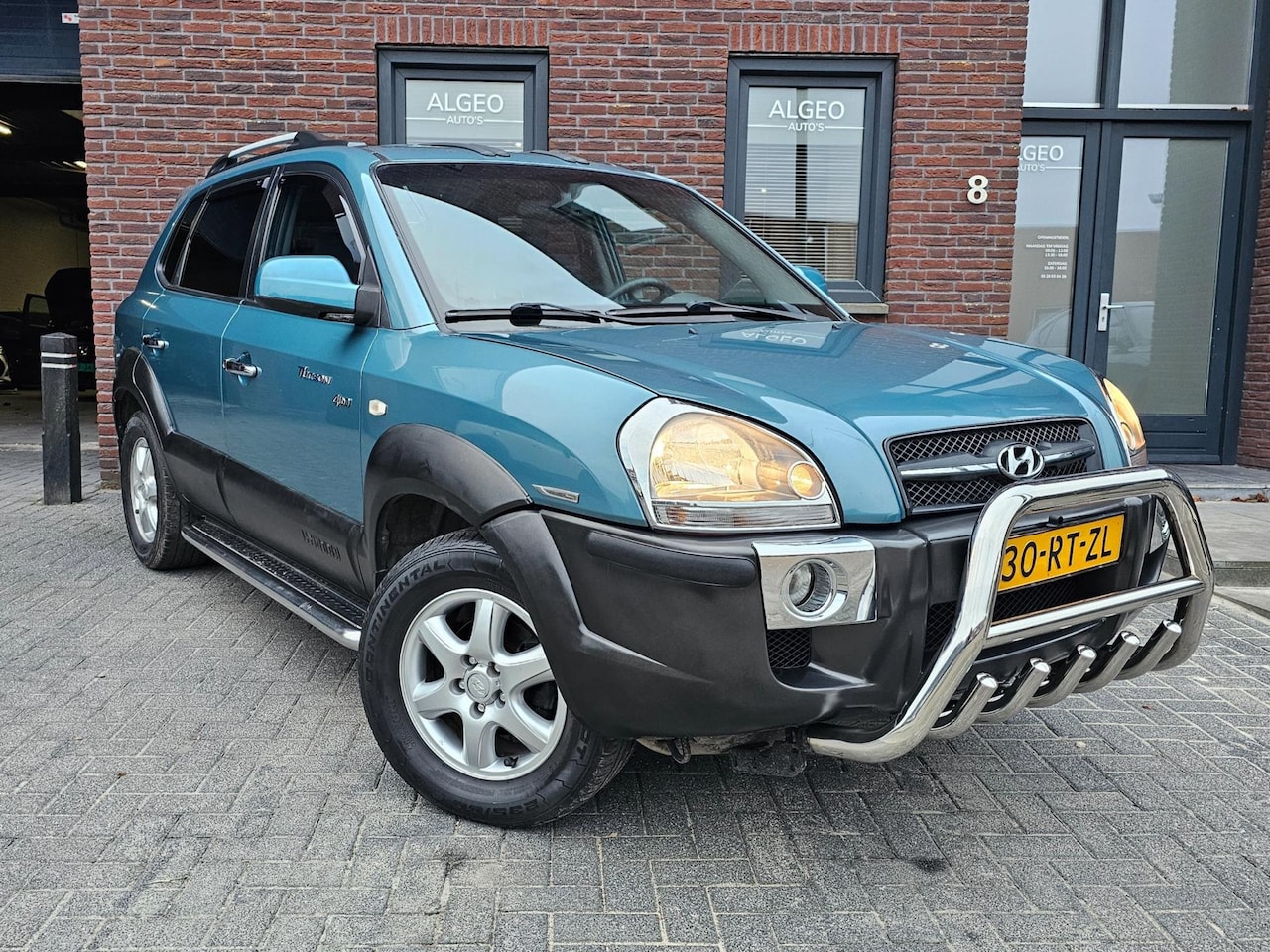 Hyundai Tucson - 2.7i V6 4WD Style Automaal Leder - AutoWereld.nl
