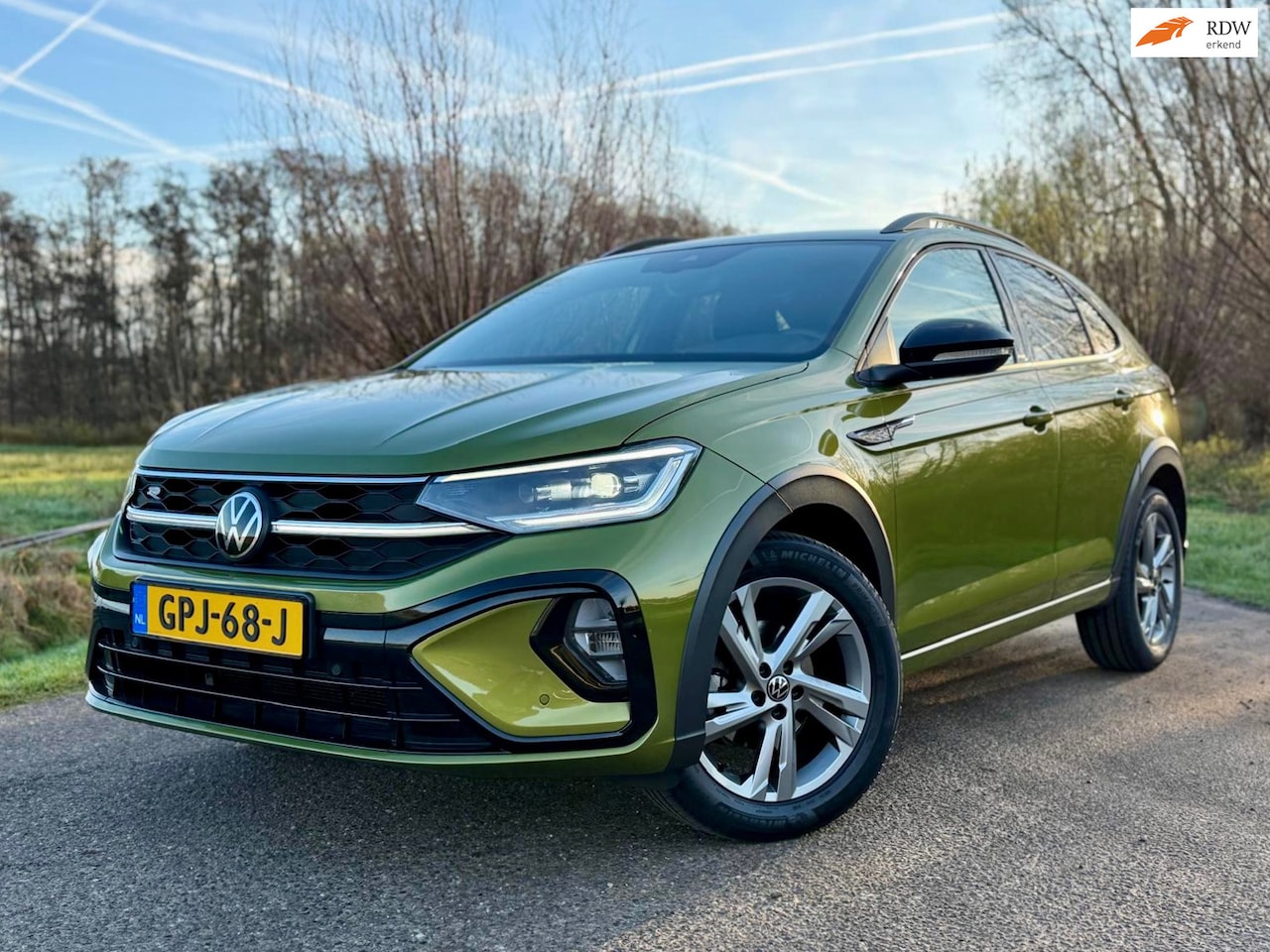 Volkswagen Taigo - 1.0 TSI R-Line Business IQ LED Automaat Clima Camera Virtueel Display Cruise Control - AutoWereld.nl