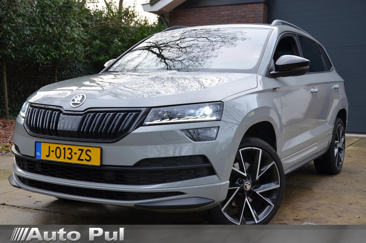 Skoda Karoq - 1.5 TSI ACT Sportline Business Automaat/Navi/Audio installatie premium/Led/Pdc/Ecc/Stuur&S - AutoWereld.nl