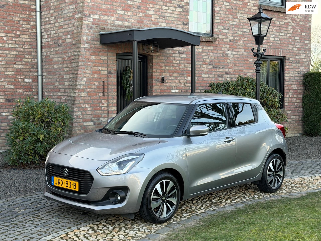 Suzuki Swift - 1.2 Stijl Navi Clima Adapt cruise Camera - AutoWereld.nl
