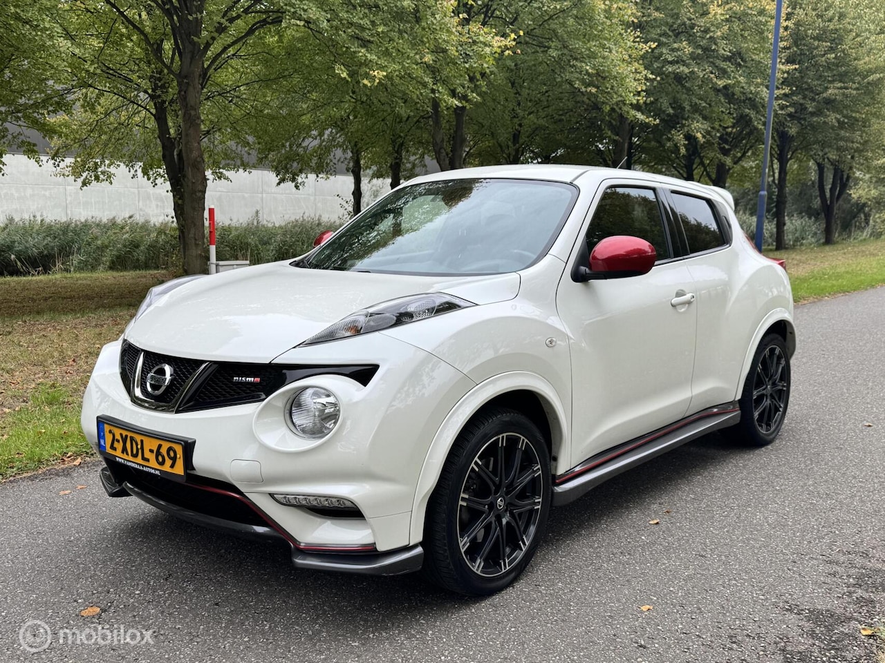 Nissan Juke - 1.6 Turbo NISMO All-Mode*AUTOMAAT*4X4*KEYLESS - AutoWereld.nl