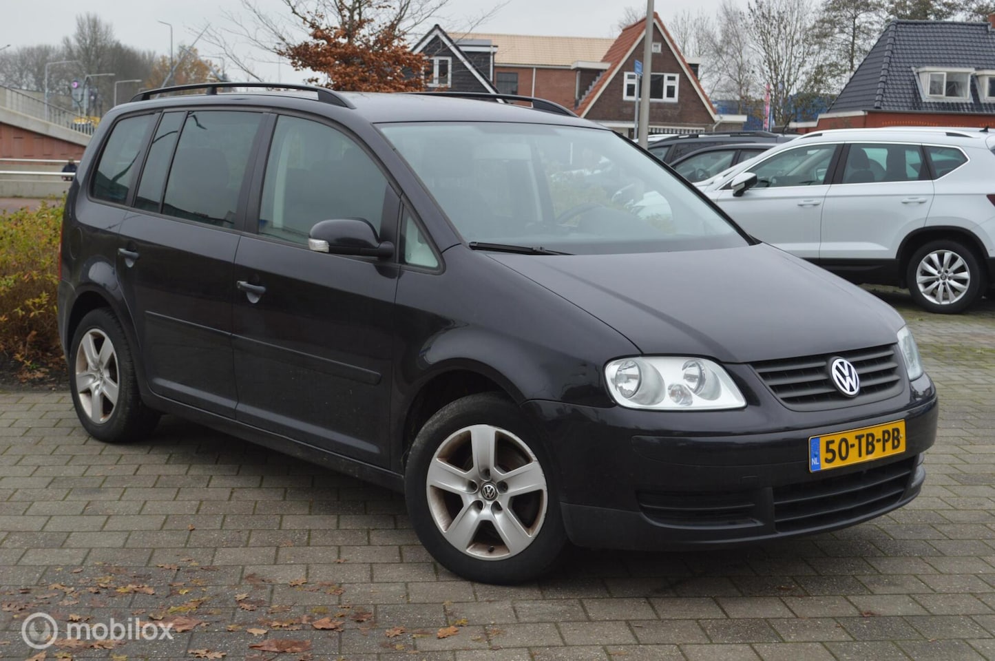 Volkswagen Touran - 1.6-16V FSI Business 1.6-16V FSI Business - AutoWereld.nl