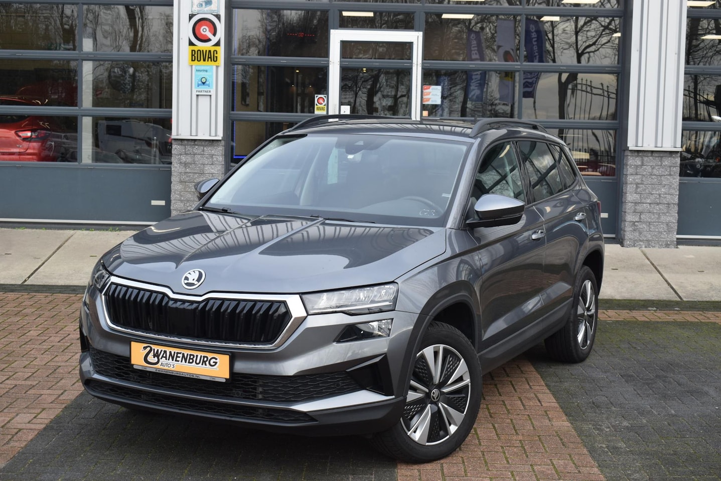Skoda Karoq - 1.5 TSI ACT Business Edition Airco, Navi, Camera, Km 67000 !! - AutoWereld.nl