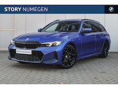 BMW 3-serie Touring - 320i M Sport Automaat / Panoramadak / Trekhaak / Sportstoelen / Achteruitrijcamera / M Spo