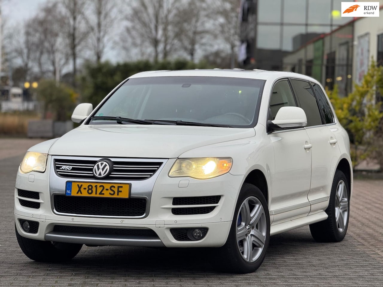 Volkswagen Touareg - 5.0 V10 TDI R50 | Leder memory stoelen | Navigatie | Elektrische achterklep | Stuurwiel el - AutoWereld.nl