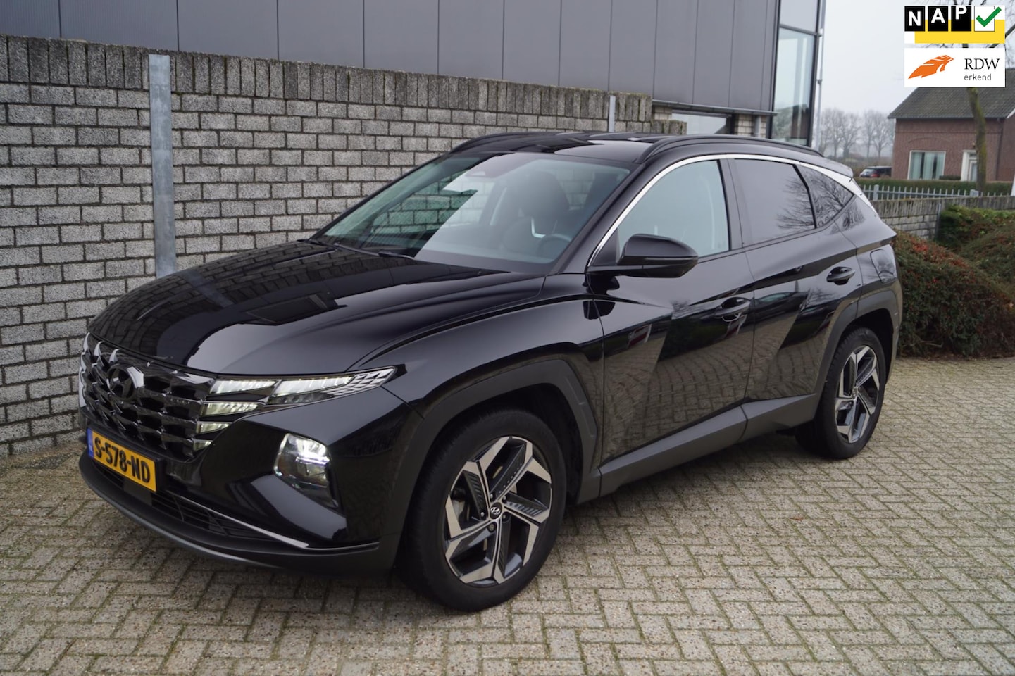 Hyundai Tucson - 1.6 T-GDI HEV Premium Autom Leder Stoel/Stuur A Bankverw Navi Camera Clima Cruise LED Kopl - AutoWereld.nl