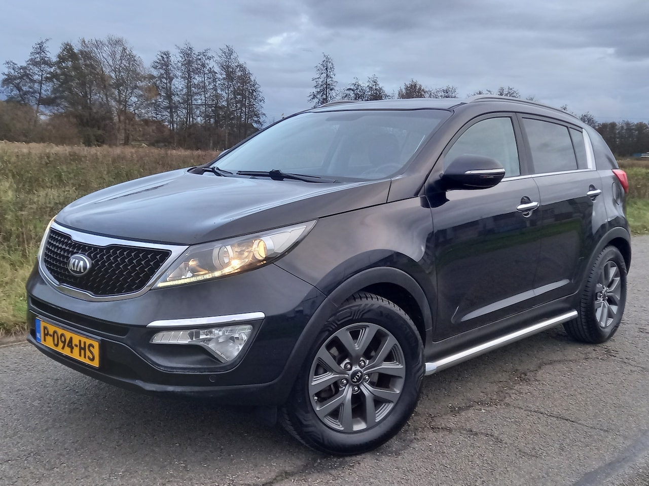 Kia Sportage - 1.6 GDI X-treme ComfortLine 1.6 GDI X-treme ComfortLine - AutoWereld.nl