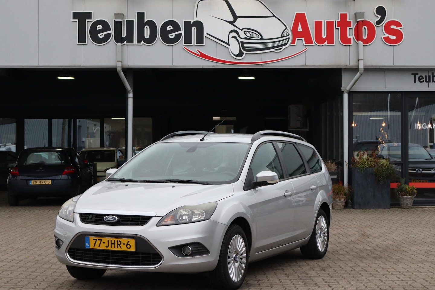 Ford Focus Wagon - 1.8 Titanium Flexi Fuel Lichtmetalen wielen, Trekhaak, Climate control - AutoWereld.nl