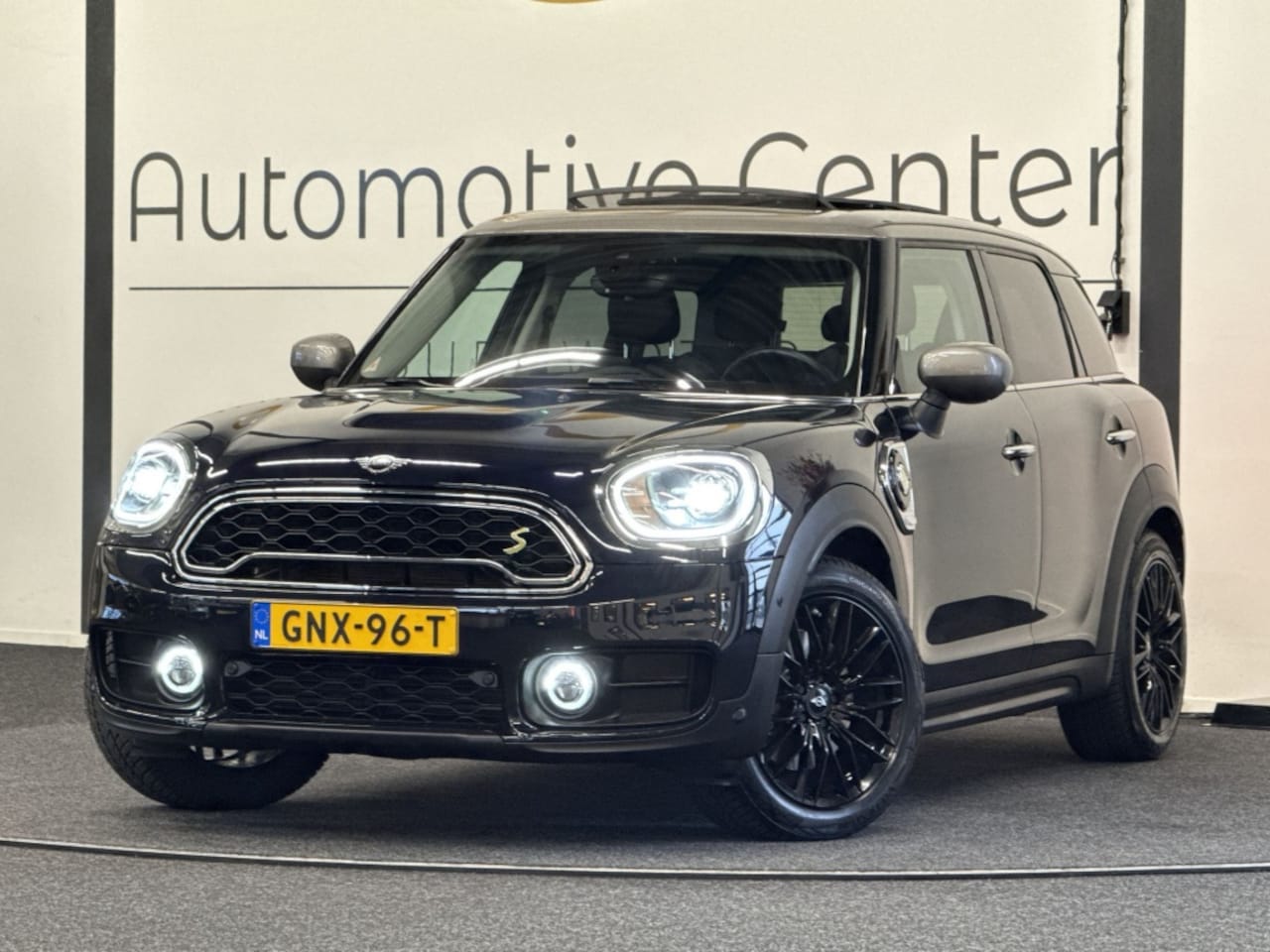 MINI Countryman - Mini 1.5 Cooper S E ALL4 Chilli | PANO | TREKHAAK | CAMERA | ACC - AutoWereld.nl