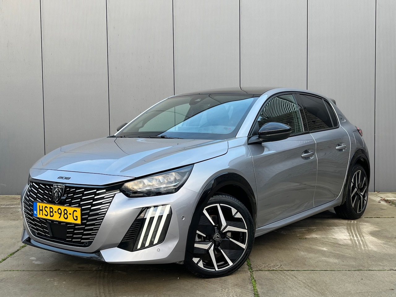 Peugeot 208 - Hybrid 136 e-DCS6 GT AUT / Panoramadak / Camera - AutoWereld.nl