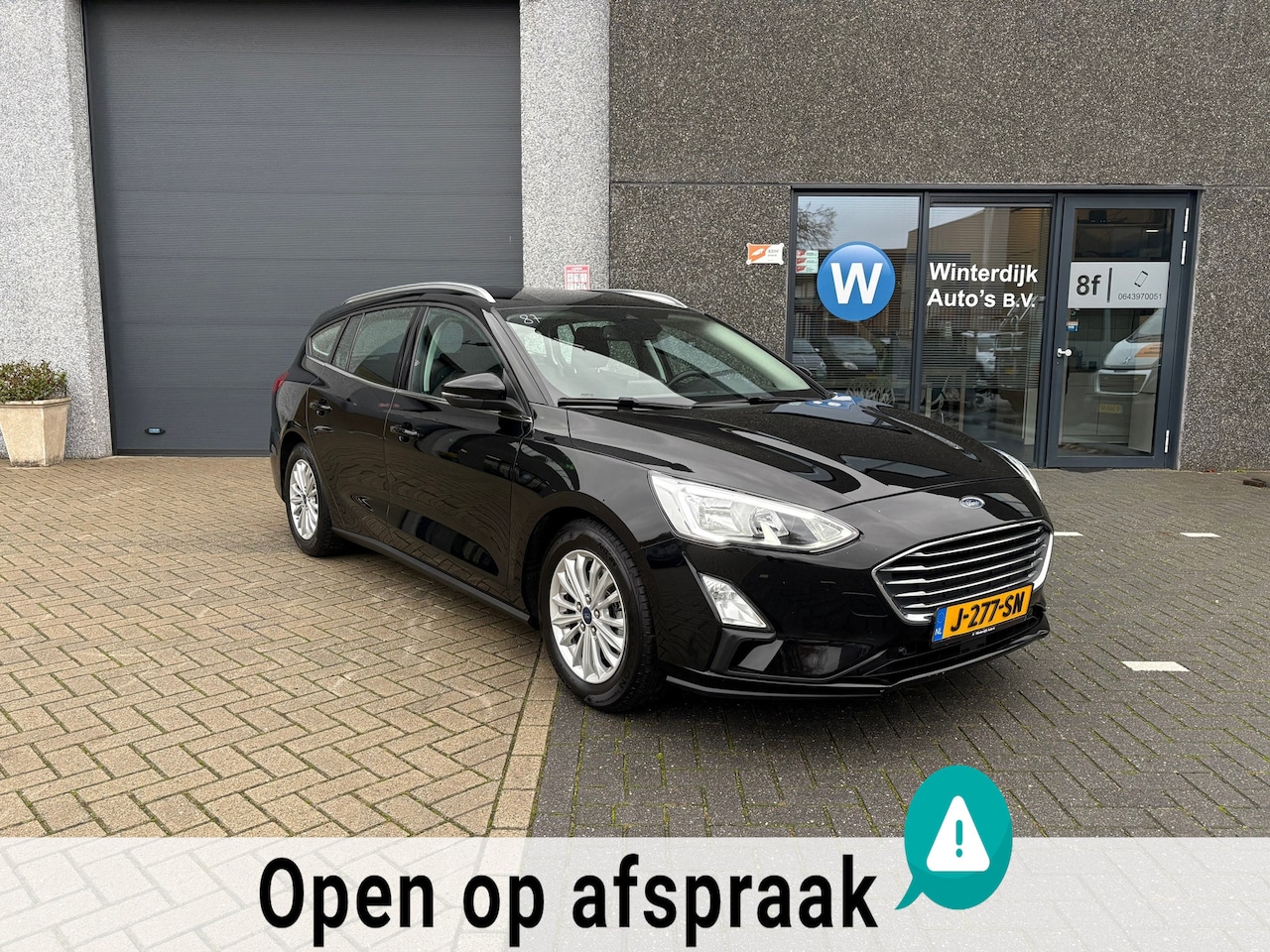 Ford Focus Wagon - 1.0 ST Line|Clima|Cruise|Trekhaak|Navigatie - AutoWereld.nl