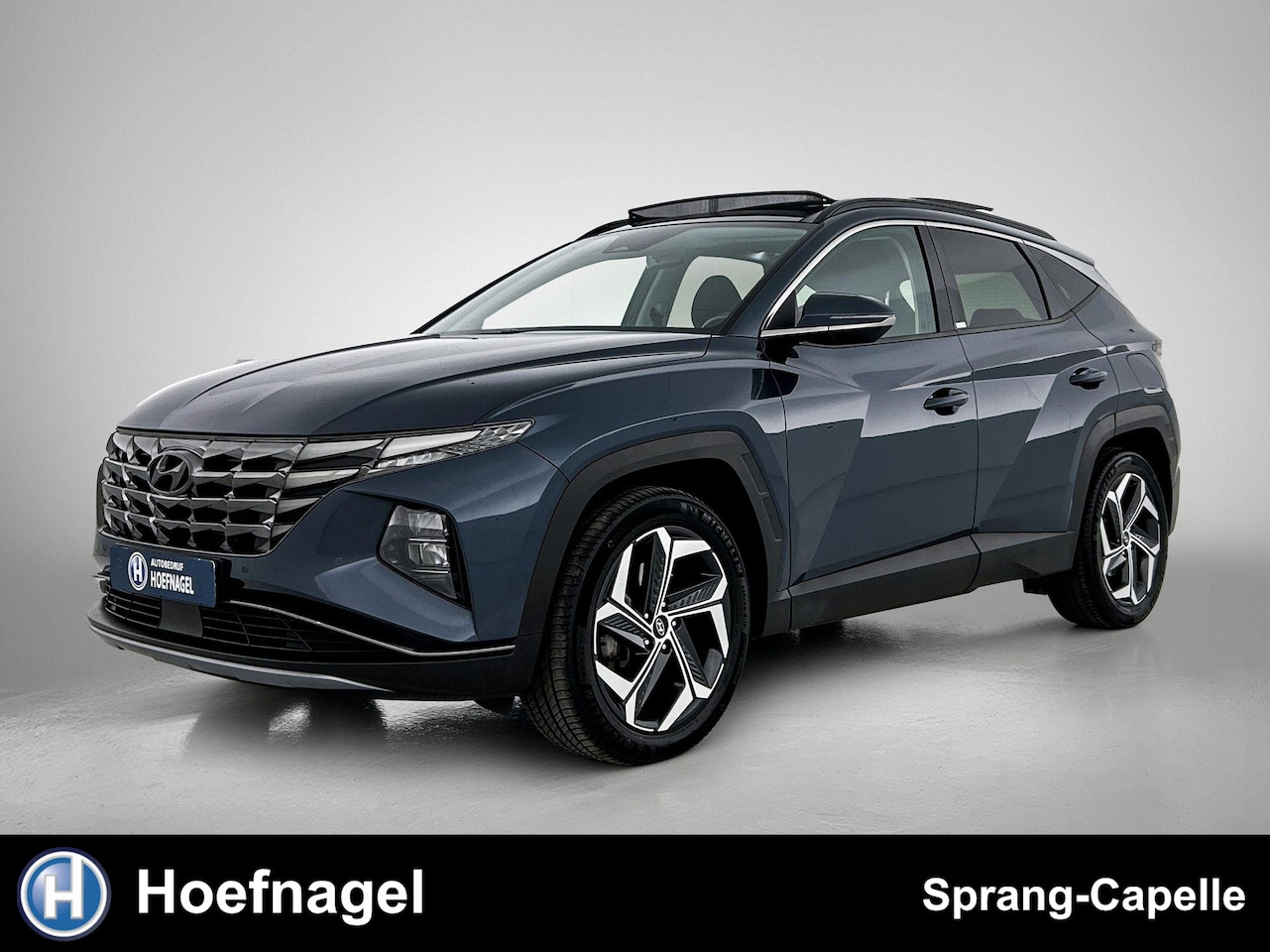 Hyundai Tucson - 1.6 T-GDI PHEV Comfort Smart 4WD | Schuifdak | Camera | Adaptive Cruise | CarPlay | - AutoWereld.nl