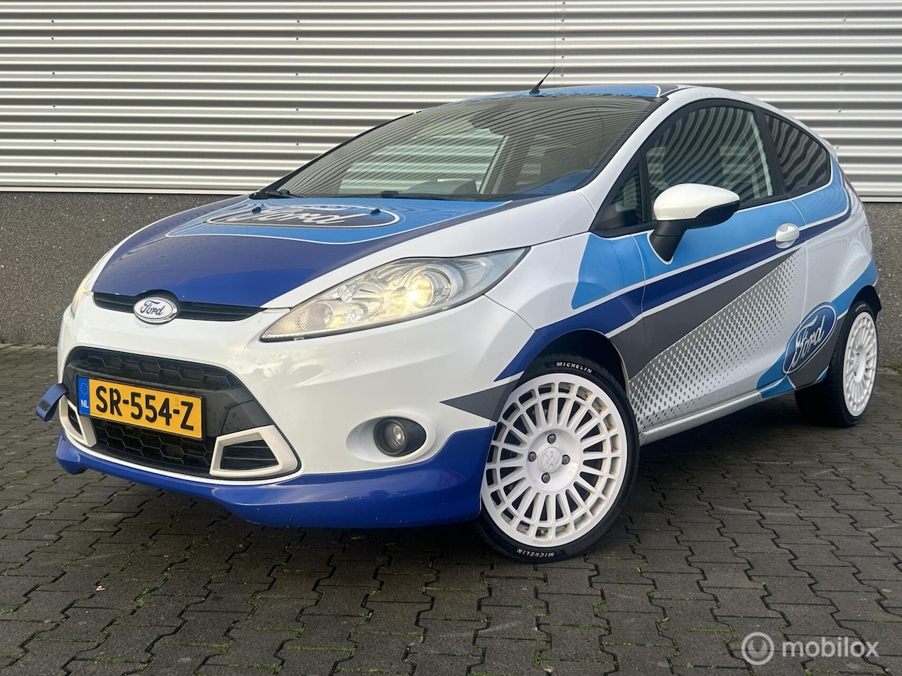 Ford Fiesta - 1.6 Titanium rally uitvoering! - AutoWereld.nl