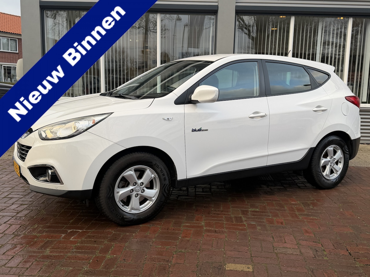 Hyundai ix35 - 1.6i GDI Dynamic Bj 2012 Km 149.000 Hoge Zit 135pk Trekhaak,Camera,18inch,Clima - AutoWereld.nl