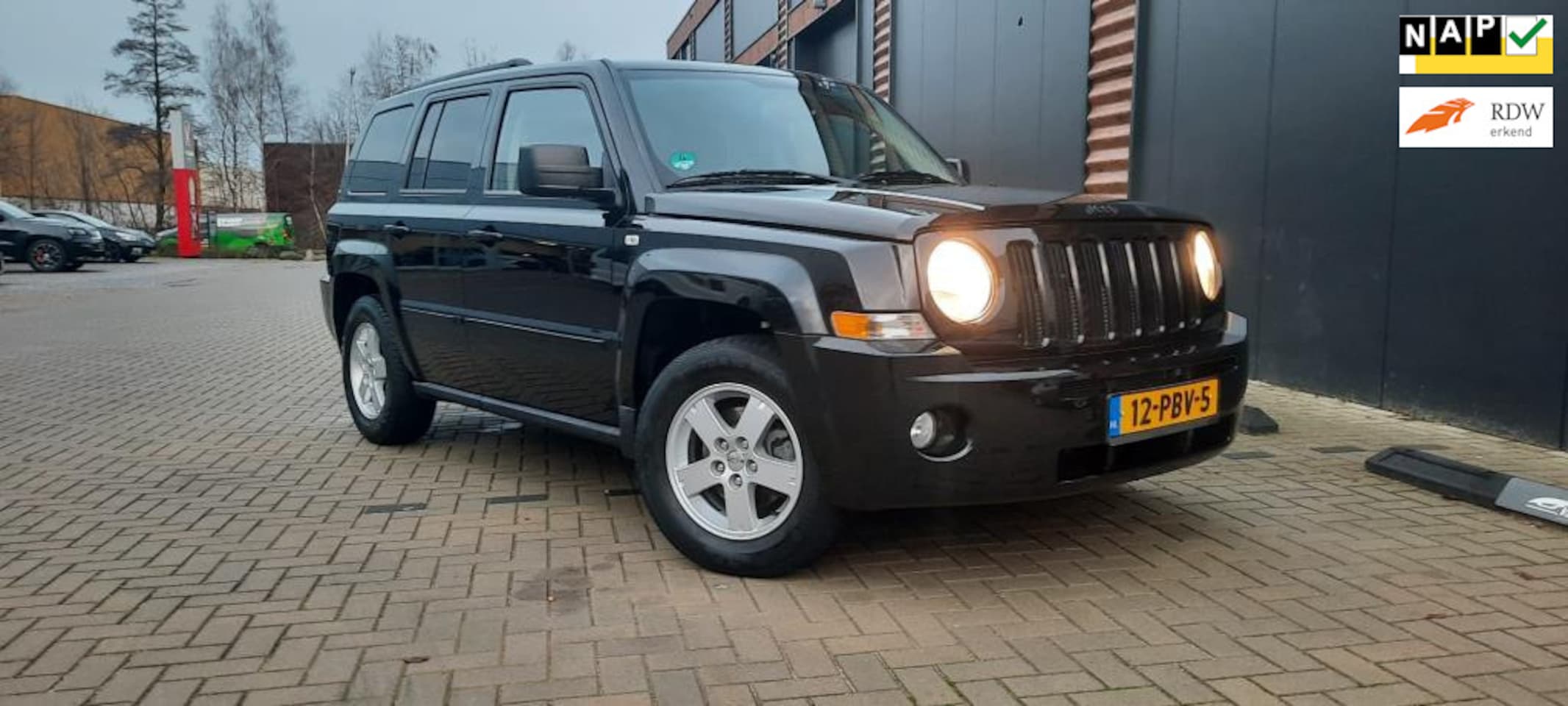 Jeep Patriot - 2.4 Limited Liberty leer automaat - AutoWereld.nl
