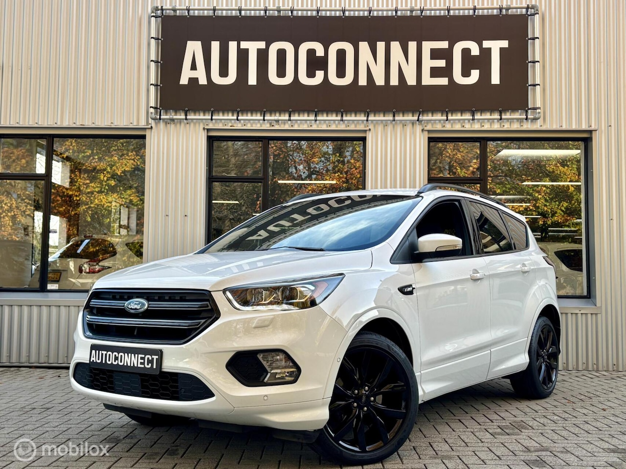 Ford Kuga - 1.5 EcoBoost ST Line. NAVI, CAMERA, CRUISE, STOELVERWARMING - AutoWereld.nl