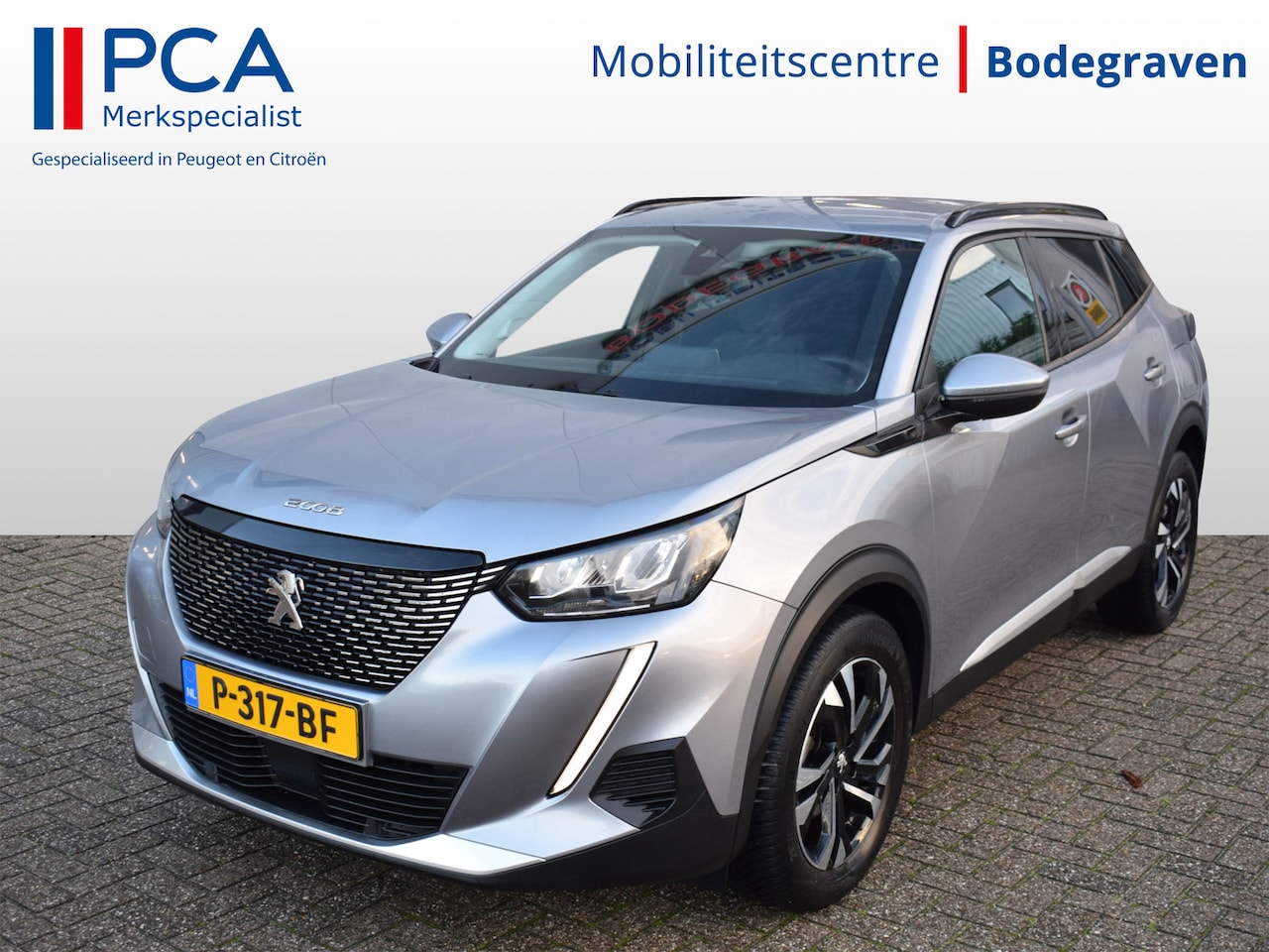 Peugeot 2008 - 1.2 PureTech Allure | NL-Auto | Keyless-Entry | Navi | Automaat - AutoWereld.nl