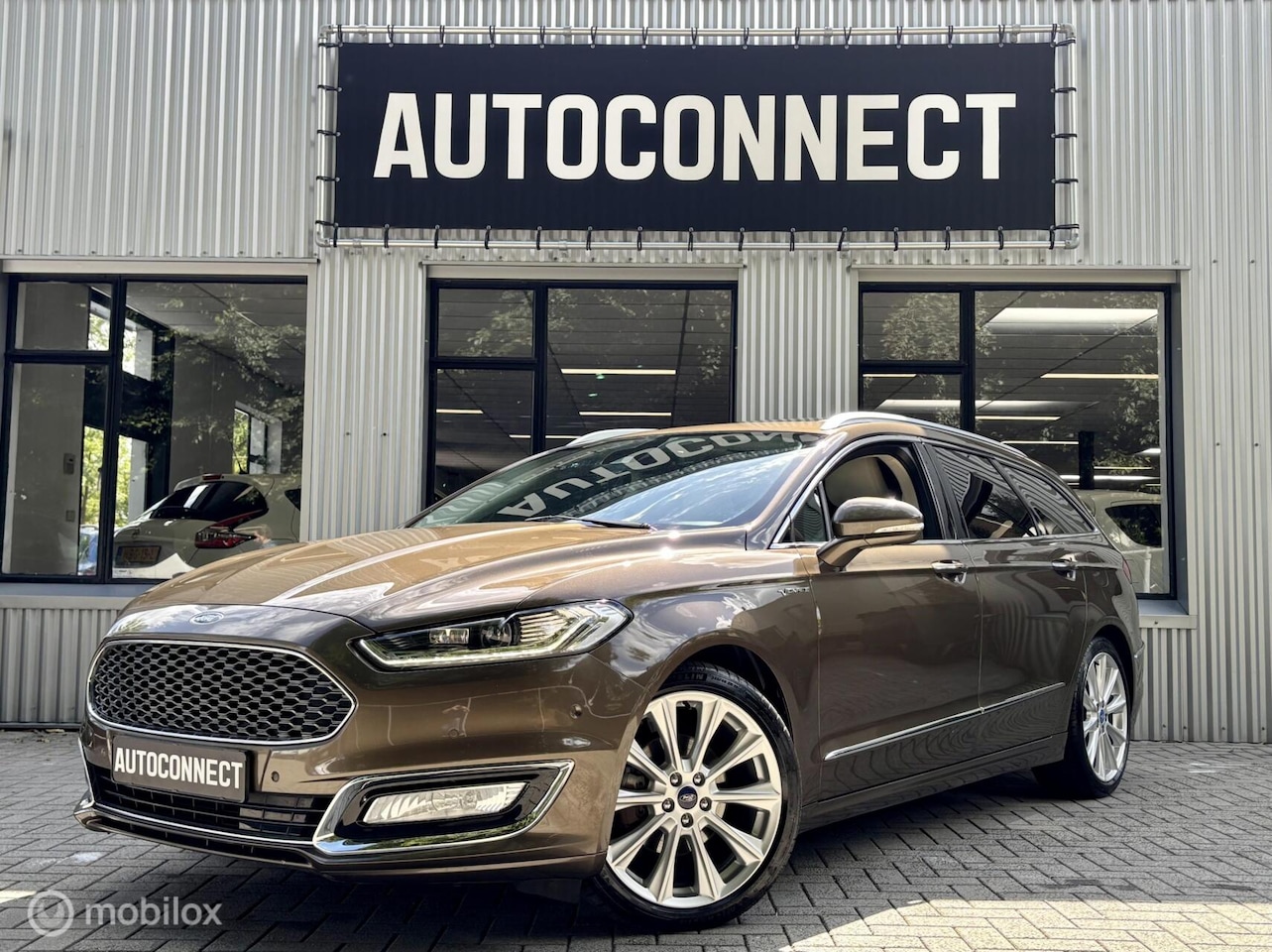 Ford Mondeo Wagon - 2.0 Vignale 2.0 Vignale, NAVI, CRUISE, CAMERA,AUTOMAAT - AutoWereld.nl