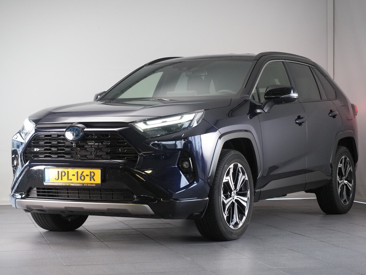 Toyota RAV4 - 2.5 Hybrid style Bi-tone | FACELIFT | JBL | Verwarmde Voorstoelen en Stuurwiel | Dodehoekd - AutoWereld.nl