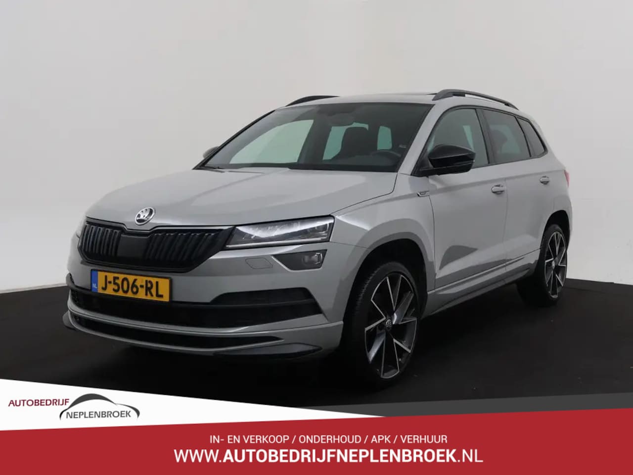 Skoda Karoq - 1.5 TSI ACT Sportline Business PANO | LED | Cruise | Navi | Stoelverw. | Trekhaak | LMV 1 - AutoWereld.nl
