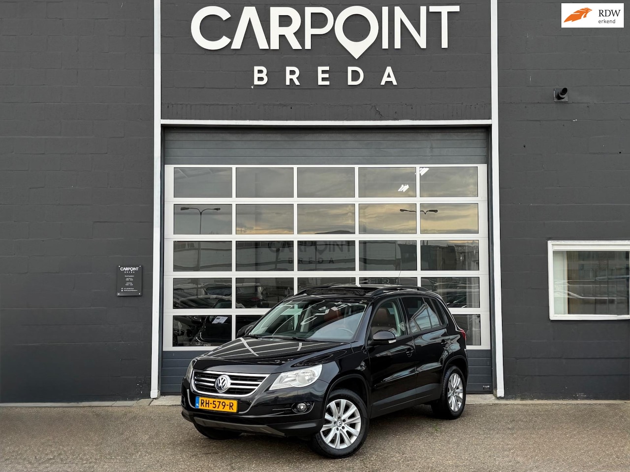 Volkswagen Tiguan - 2.0 TSI Sport&Style 4Motion, PANO, LEER, NAVI, CAMERA, TREKHAAK, CRUISE - AutoWereld.nl