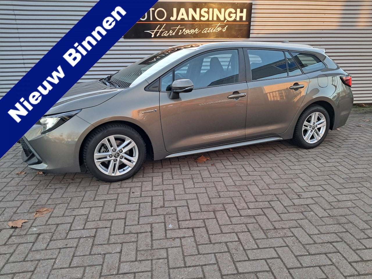 Toyota Corolla Touring Sports - 1.8 Hybrid Active | LM Velgen | Clima | Cruise | Ndl auto!! | Navigatie | Led | Apple carp - AutoWereld.nl