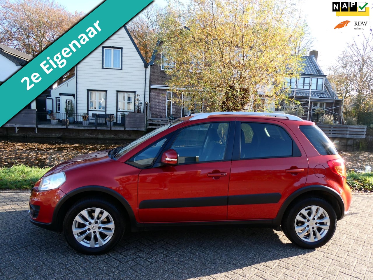 Suzuki SX4 - 1.6 4WD 120pk 2e eigenaar Clima Navi Trekhaak 1200kg Keyless - AutoWereld.nl