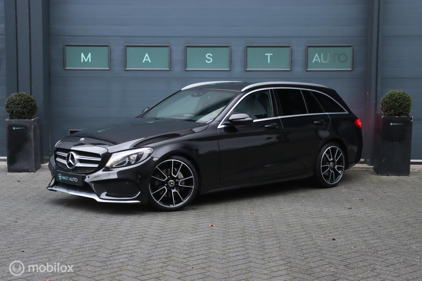 Mercedes-Benz C-klasse Estate - 180 AMG|Leder|LED|PDC|Camera|Sfeerverlichting| - AutoWereld.nl
