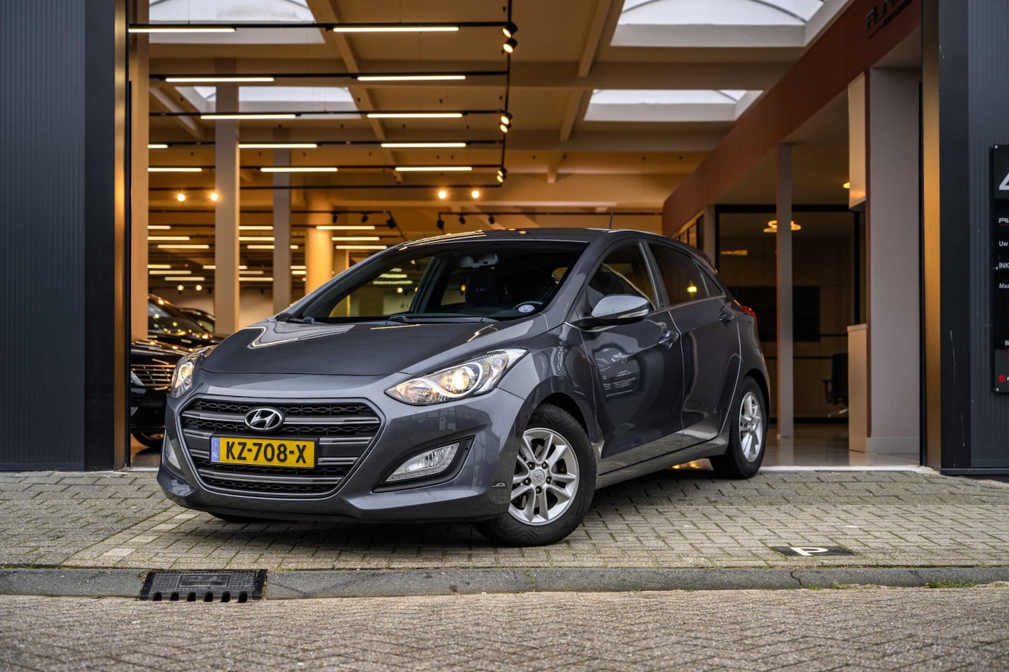 Hyundai i30 - 1.6 GDi GO! 2016|Camera|Cruise Control|Bluetooth|Trekhaak|Navi| - AutoWereld.nl