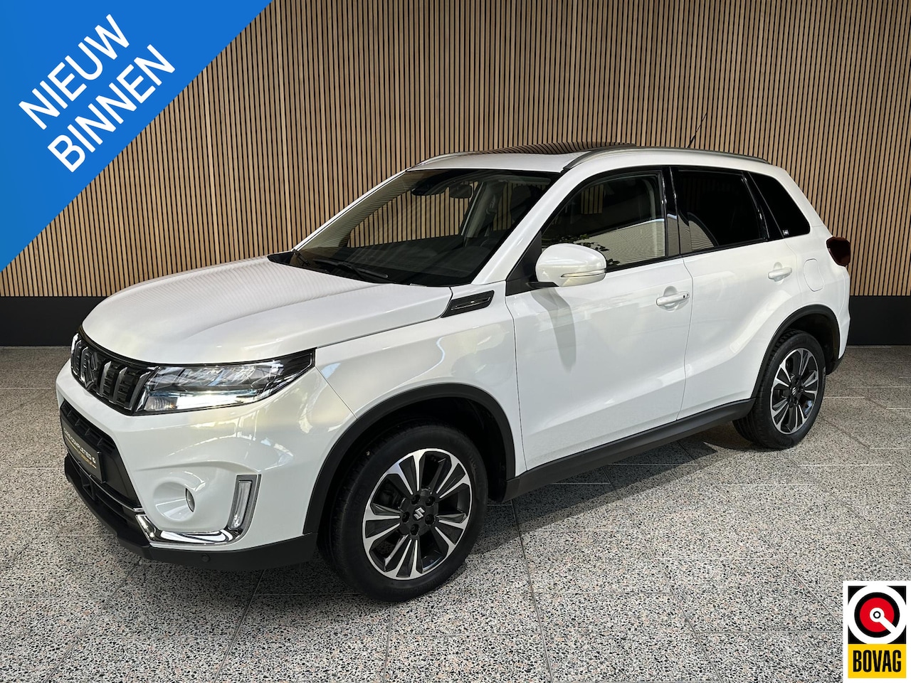 Suzuki Vitara - 1.4 Boosterjet Style Smart Hybrid Schuif / kantal dak | Lederen stoelen | Stoelverwarming - AutoWereld.nl