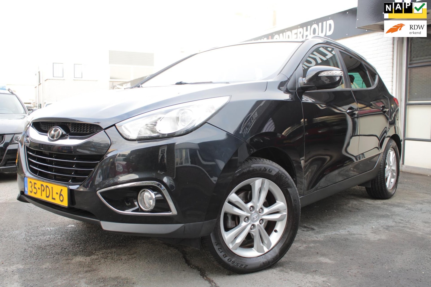 Hyundai ix35 - 2.0i Business Edition | Airco | Cruise Control | Elec ramen | Navi | Parkeer camera - AutoWereld.nl