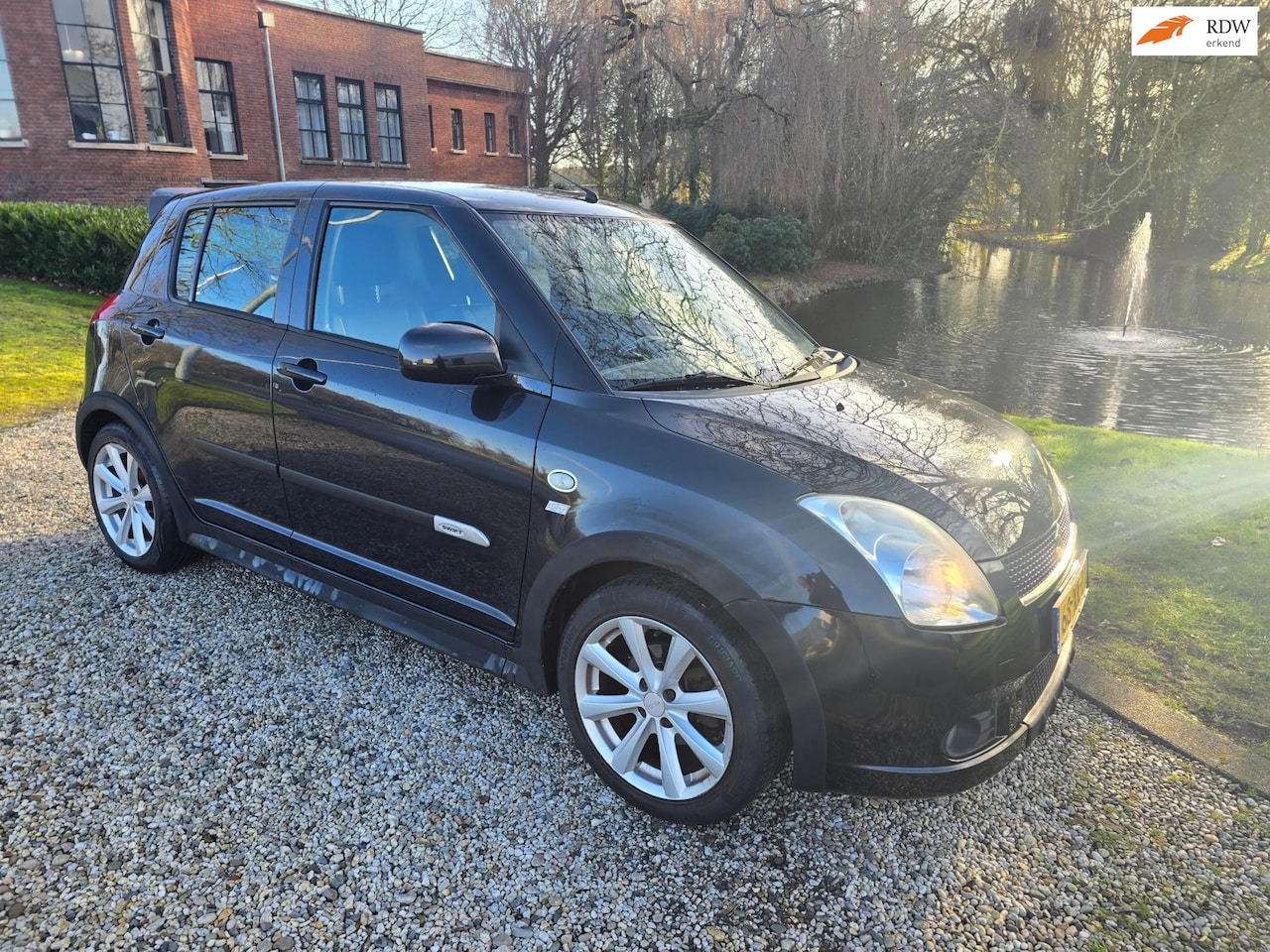 Suzuki Swift - 1.3 GLX GT Pakket leer airco 5 deurs - AutoWereld.nl