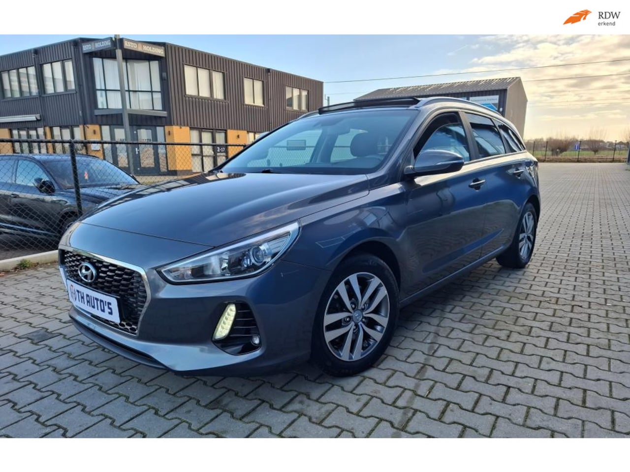 Hyundai i30 Wagon - 1.4 T-GDI Premium/airco/navigatie/camera/Panorama dak - AutoWereld.nl